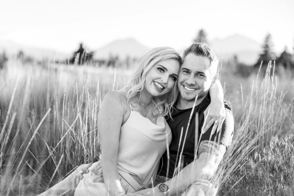 Black and white image of a smiling couple.