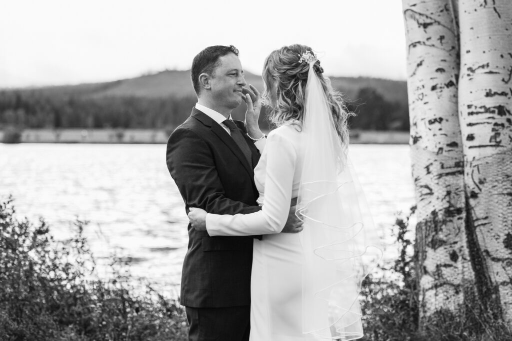 Black and white image of a special moment between the bride and groom. 