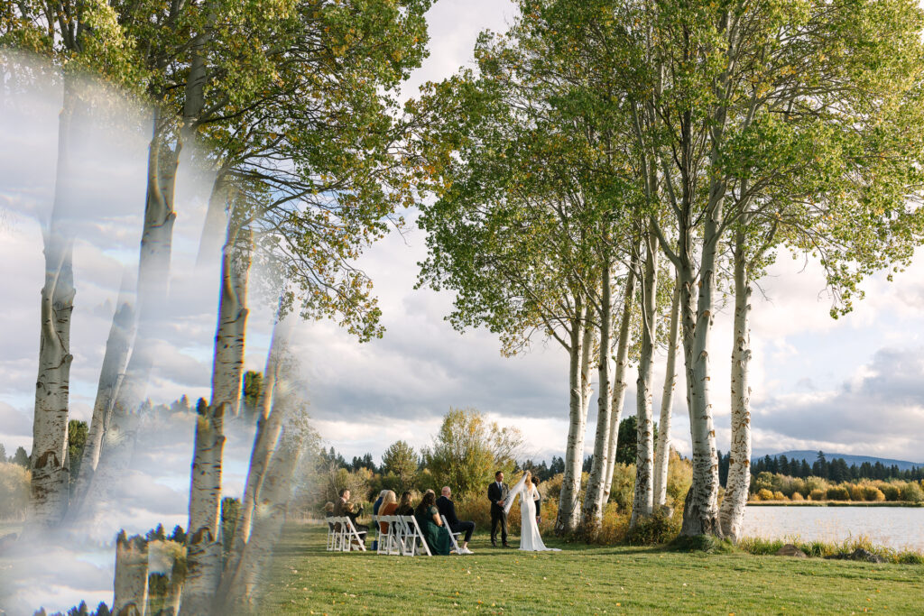 Small ceremony near aspen trees from a distance.