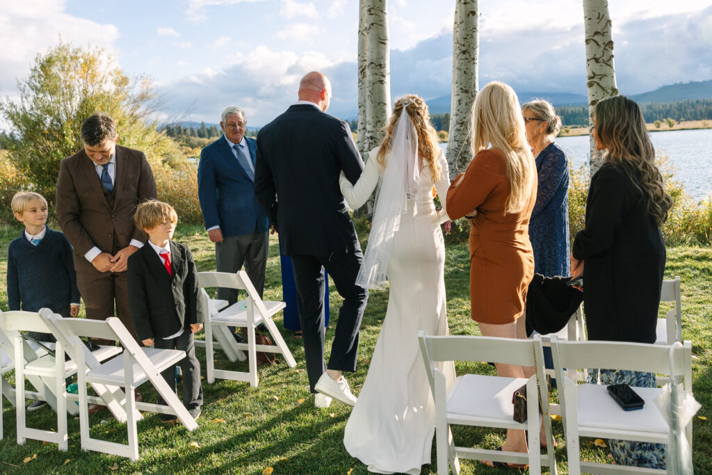 Intimate outdoor ceremony on a crisp fall afternoon at Black Butte Ranch. 
