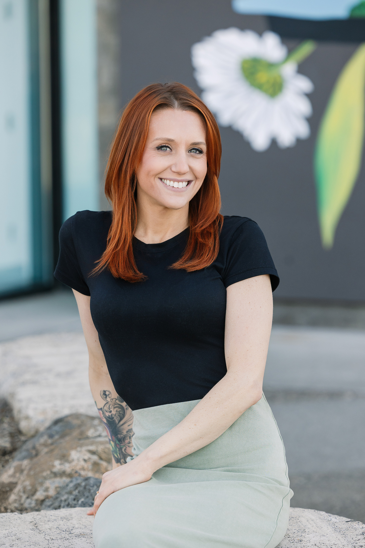 Casual outdoor headshot session for a woman outdoors.