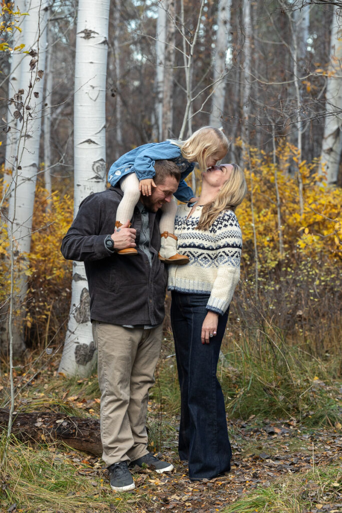 Family photos in an aspen grove during late fall.